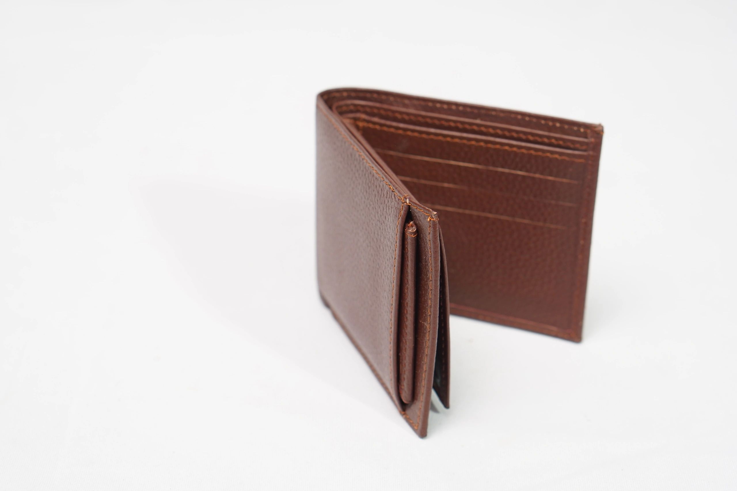 Leather wallet detail showing stitching and card slots