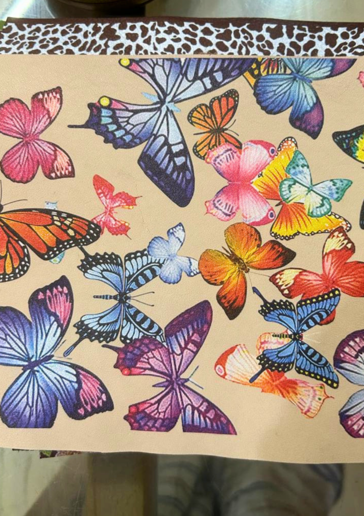 Butterfly print leather
