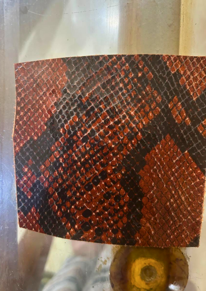 red and black print leather